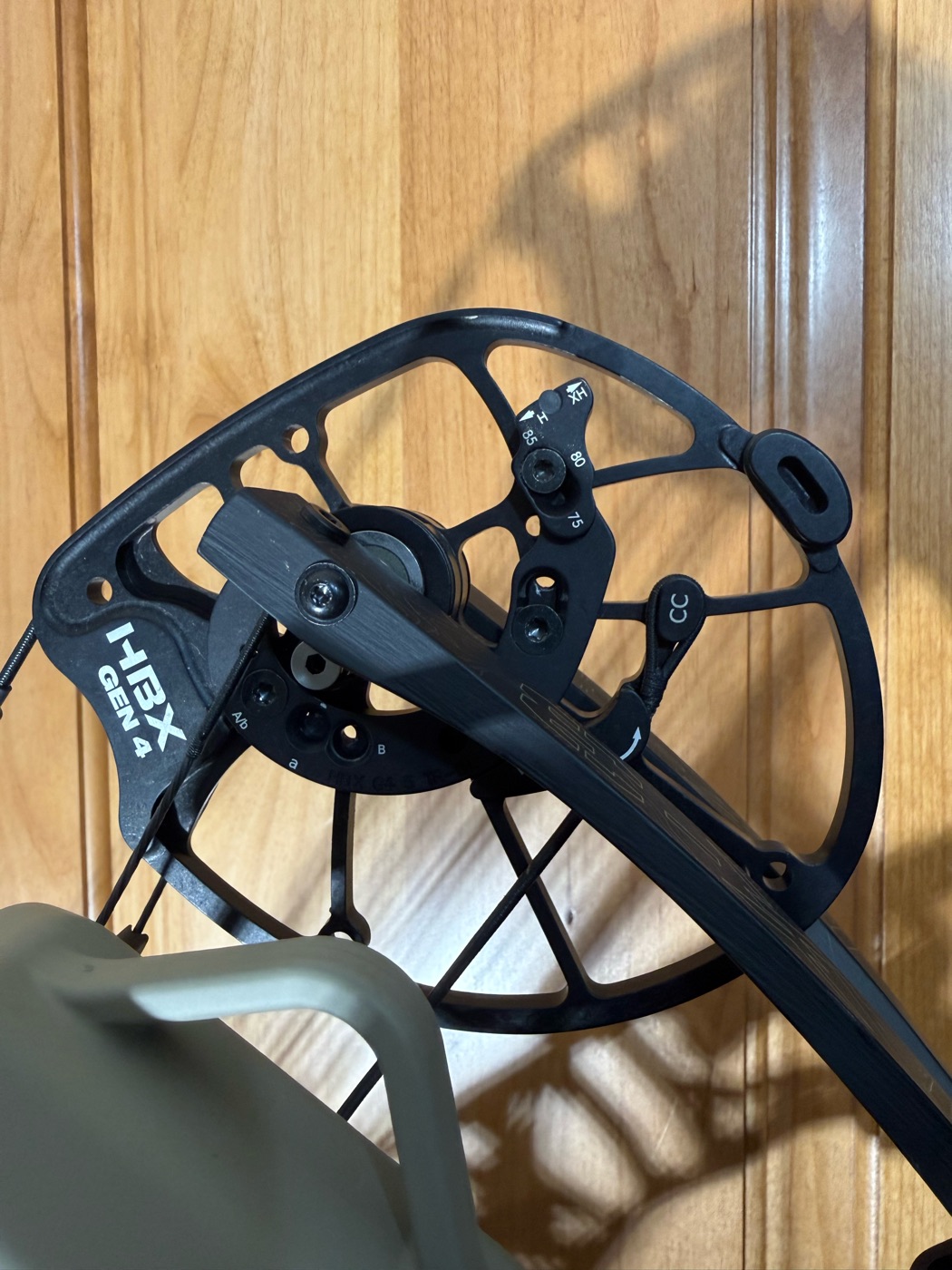 Close-up of the cam system on a Hoyt hunting bow