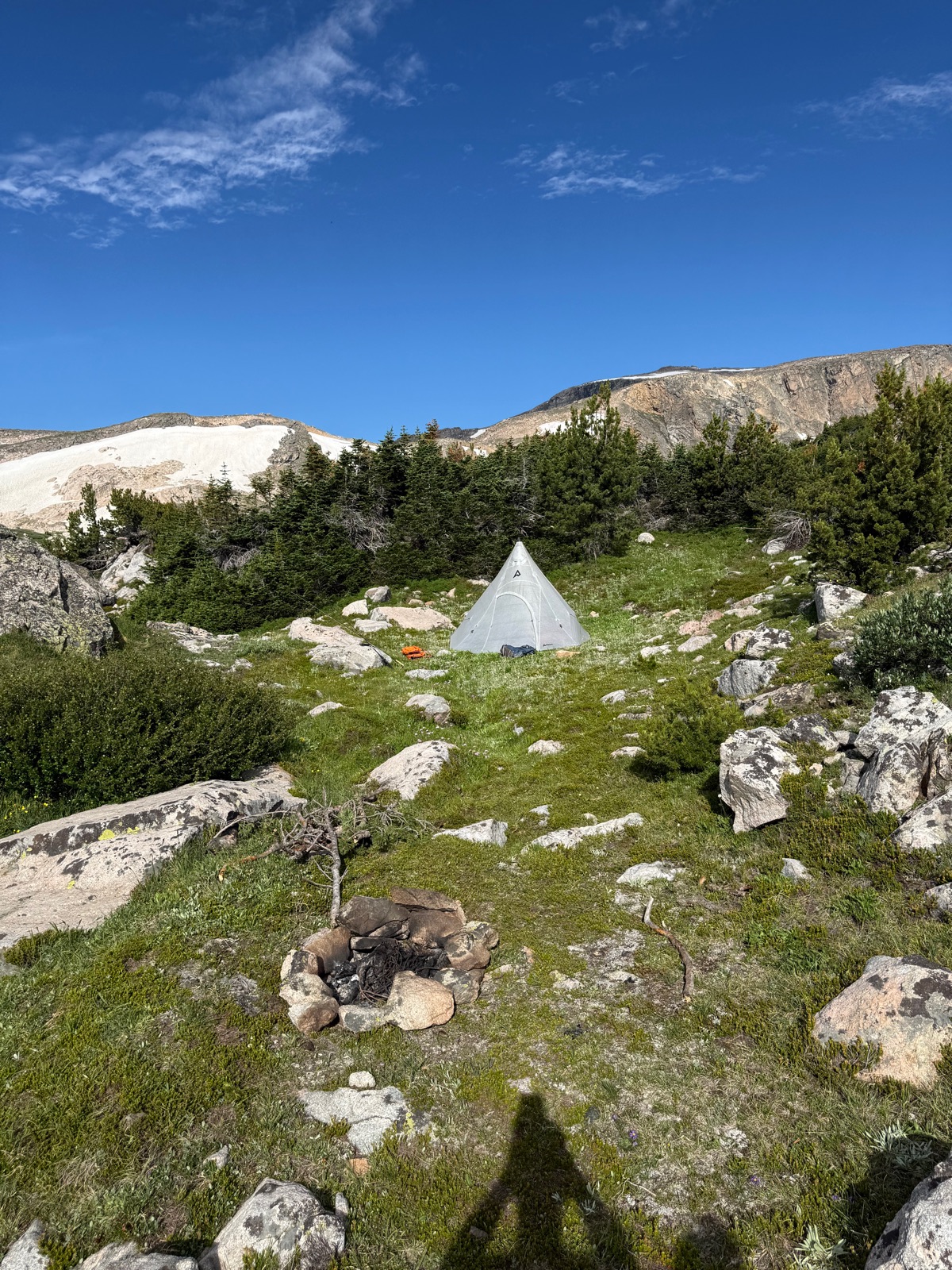 The PEAX Solitude 4 Dyneema tipi pitched in an alpine basin in the Montana backcountry